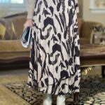 Φούστα πλισέ εμπριμέ μπεζ