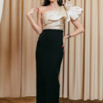 Φόρεμα maxi μαύρο με εντυπωσιακό σαμπανιζέ φιόγκο