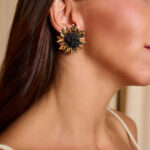 Σκουλαρίκια με μαύρο κέντρο και χρυσές ακτίνες