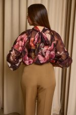 Μπλούζα see through με φιόγκο και floral print μαύρο