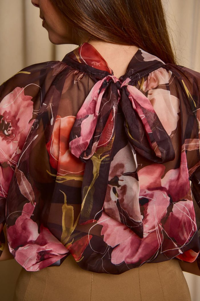 Μπλούζα see through με φιόγκο και floral print μαύρο