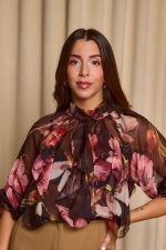 Μπλούζα see through με φιόγκο και floral print μαύρο